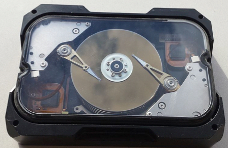 a Conner multi-actuator drive from 1991. It's a 5.25" drive with a bunch of 3.5" platters, and one actuator arm on each side. 510MB, I think.