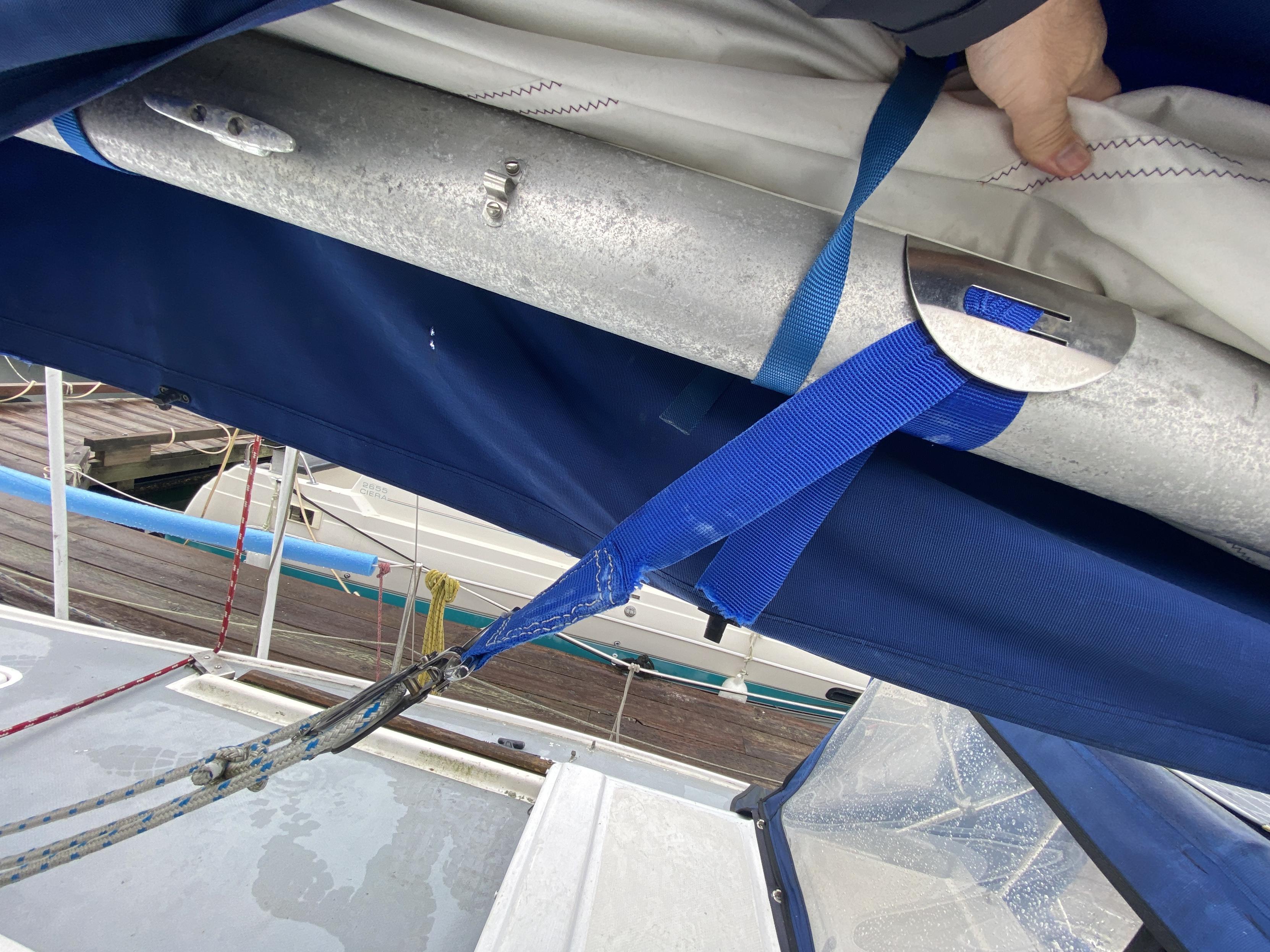 A second view of the "healthy" side, showing that this is the only side sufficiently attached to the vang. Not safe; other side should also be attached.