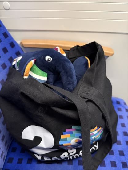 PHP Elephpant plush looking out of bag