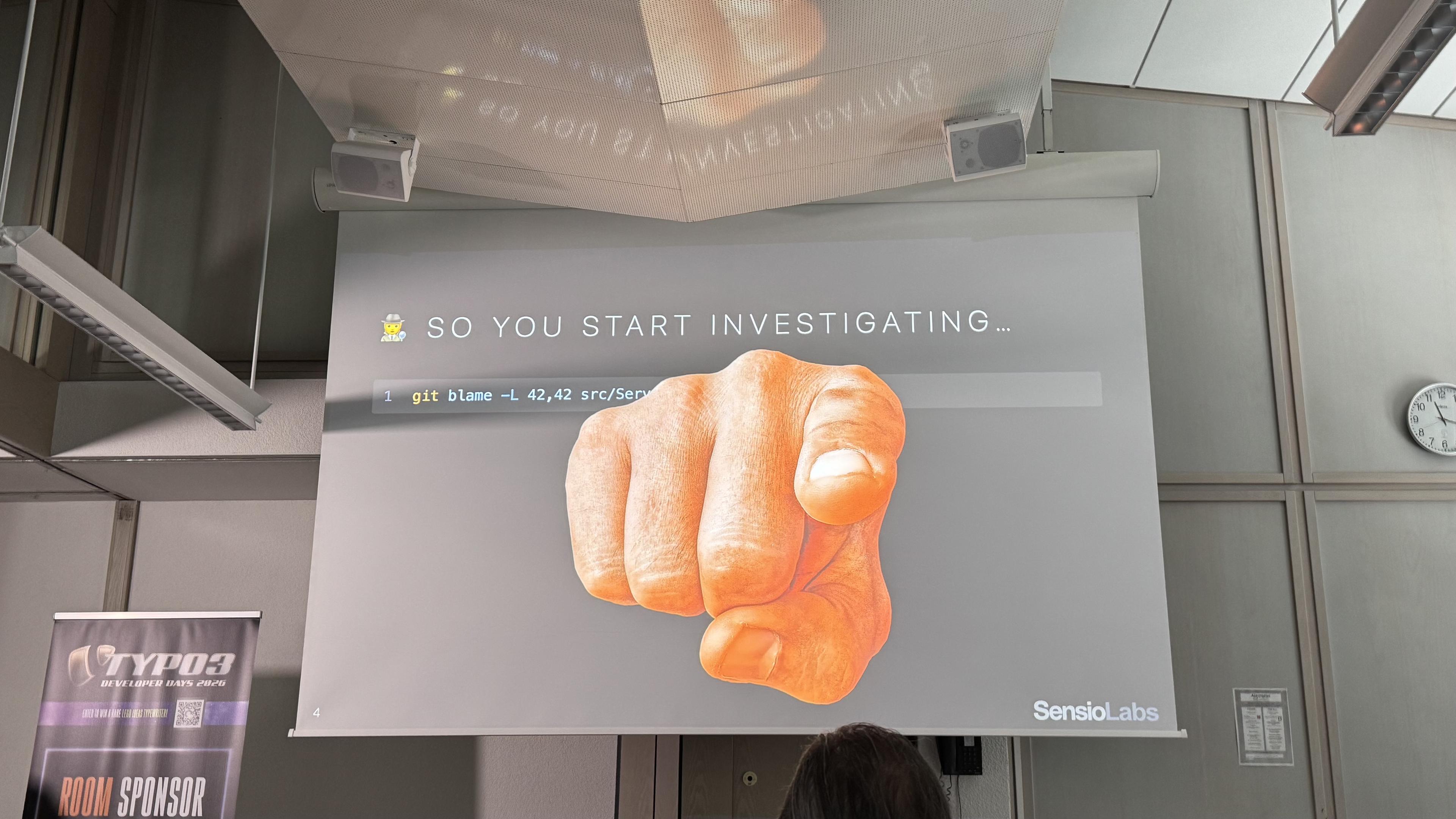 Slide showing git blame and a finger pointing at yourself